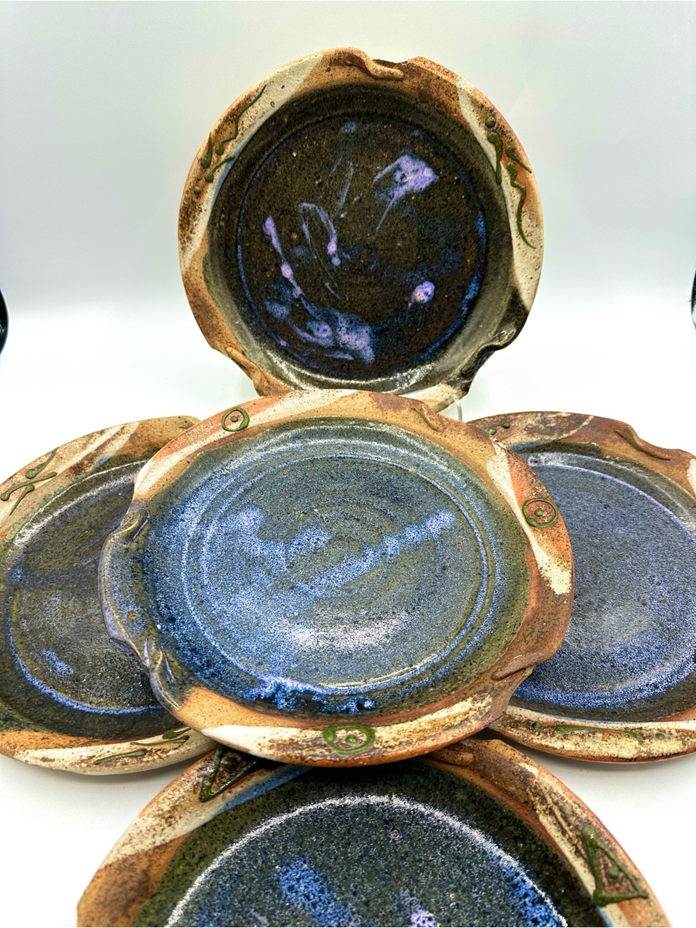 A Set of 5 Studio Art Matching Plates. Signed & dated 1995.